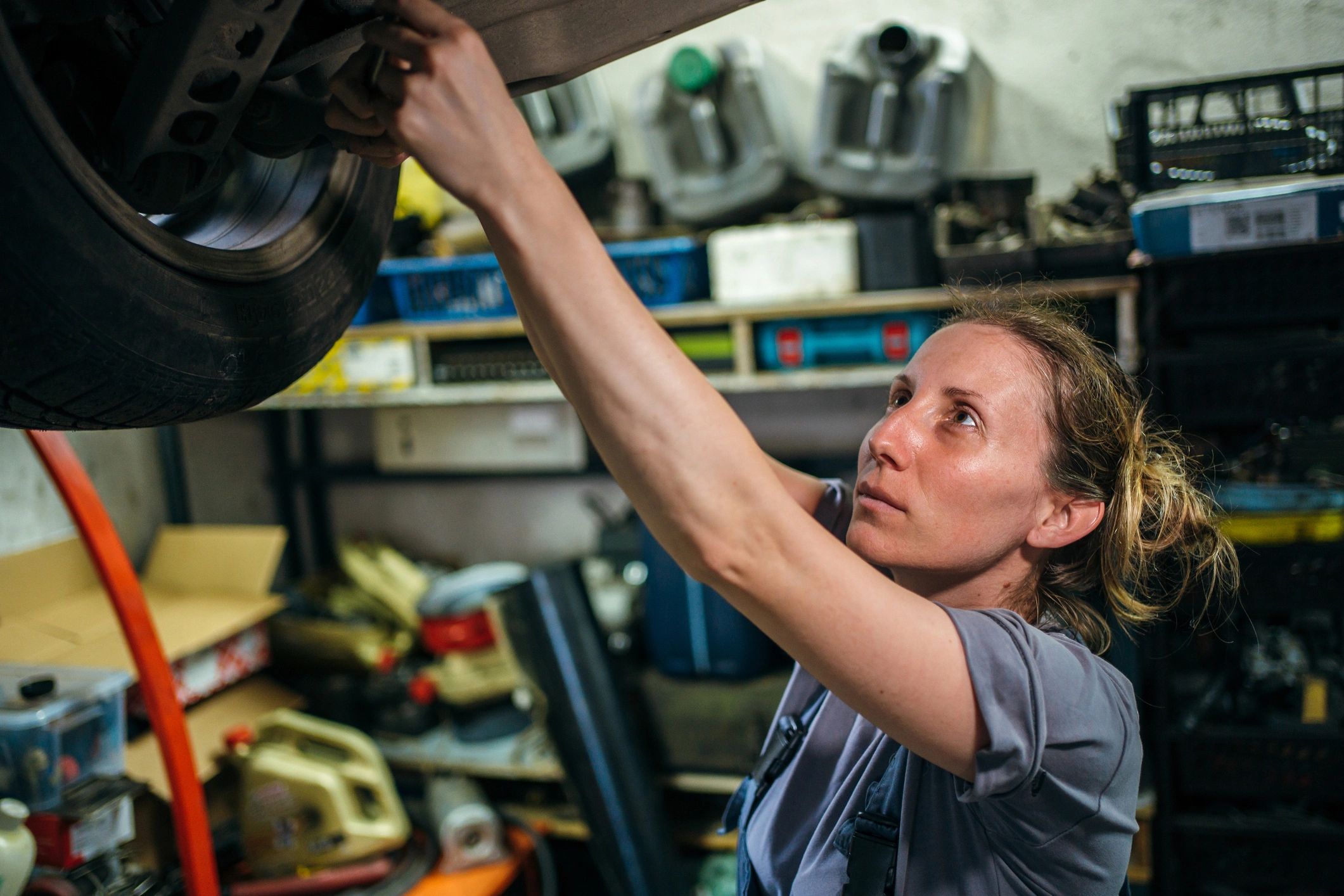 Certified technician performing vehicle service inspection